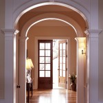 Series of arched doorways lead to a traditional foyer